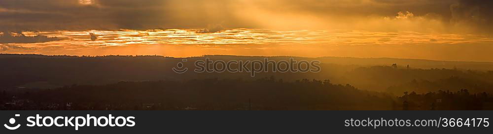 Beautiful colorful sunset over countryside landscape