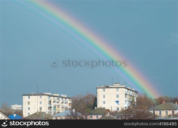 Beautiful colourful rainbow in the blue sky