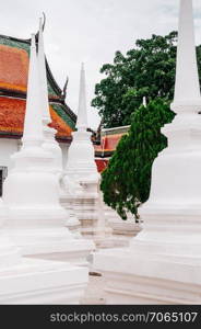 Beautiful Colourful roof and white pagoda of Wat Phra Mahathat Nakhon Si Thammarat, Thailand