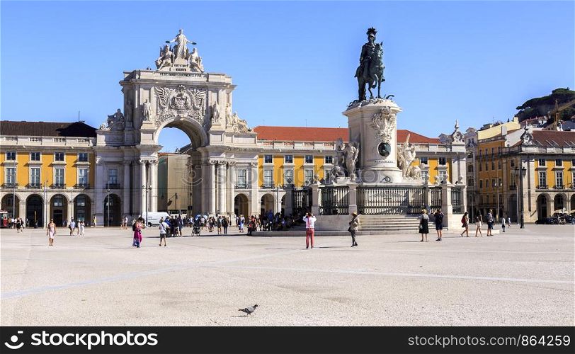 Beautiful Commerce Square with King Jose Statue and Augusta Street Triumphal Arch during early hours of the morning, in Lisbon, Portugal