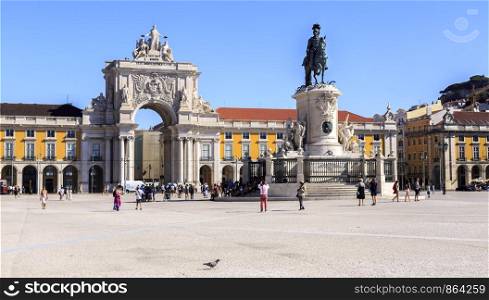Beautiful Commerce Square with King Jose Statue and Augusta Street Triumphal Arch during early hours of the morning, in Lisbon, Portugal