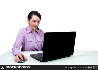 Beautiful computer savvy young woman using a laptop . Sunset over a Lake