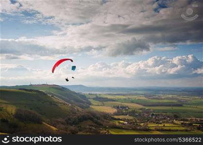 Beautiful countryside landscape across rolling hills with lovely cloud formations