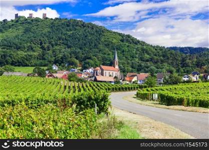 "Beautiful countryside of Alsace region- famous "vine route" in France. Husseren les chateaux village. Picturesque countryside of Alsace wine region of France"