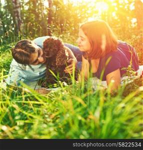 Beautiful couple with dog outdoors