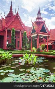 Beautiful courtyard and elegant exterior of the National Museum of Cambodia, tropical pond with blooming water lilies. Phnom Penh, Cambodia. The museum is open to the Public.
