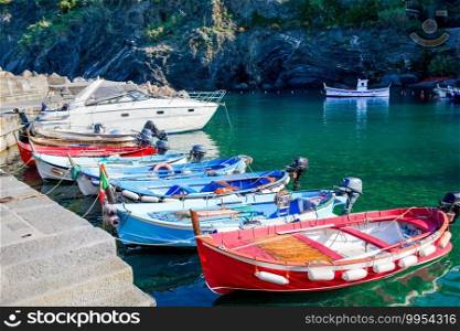 Beautiful cozy bay with boats and clear turquoise water in Italy. Beautiful cozy bay with boats and clear turquoise water in Italy coast, Liguria, Europe