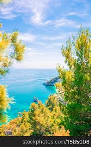 Beautiful cozy bay with clear turquoise water in Italy on Gargano reserve. Beautiful cozy bay with boats and clear turquoise water in Italy