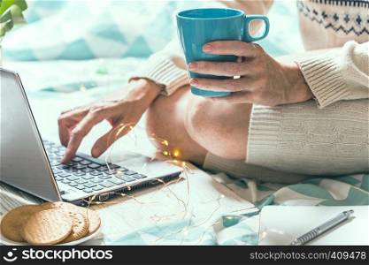 beautiful cozy morning - girl sitting with a laptop