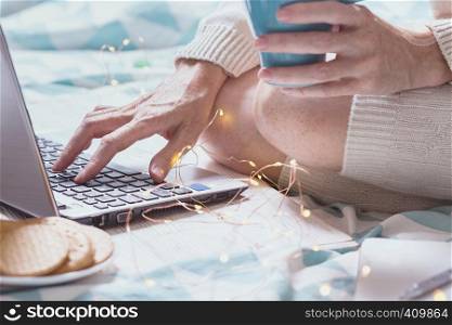 beautiful cozy morning - girl sitting with a laptop