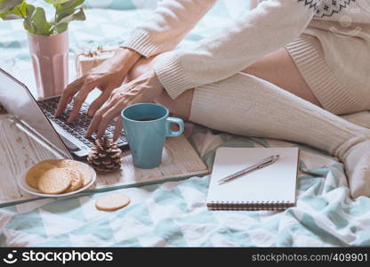 beautiful cozy morning - girl sitting with a laptop