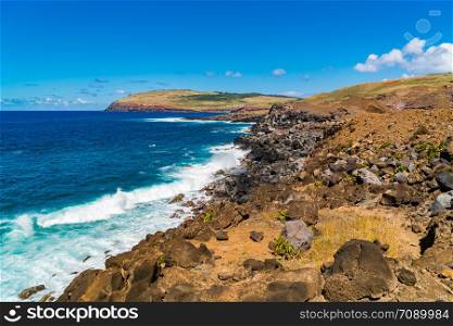 Beautiful crashing waves of the South Paciffic Ocean at Rapa Nui or Easter Island in Chile