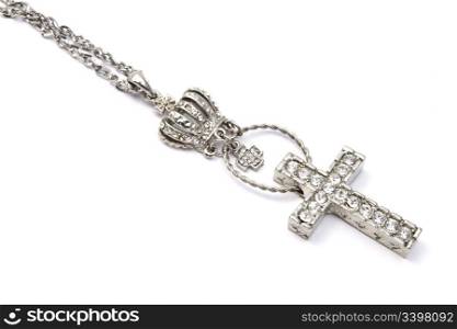 Beautiful cross necklace closeup on white background