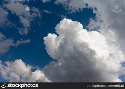 Beautiful Cumulus Cloud in the Bright Sky Background the sky and cloud concept related idea.