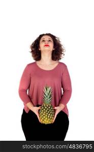 Beautiful curvy girl holding and pineapple isolated on a white background