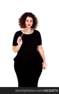 Beautiful curvy girl with a lollipop isolated on a white bacground