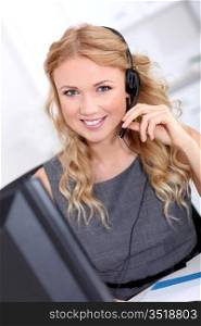 Beautiful customer-service woman with headset on