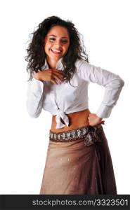 Beautiful cute Caucasian Hispanic Latina woman with curly hair, hand on hip, laughing and having fun expression, wearing white shirt and brown skirt, isolated.
