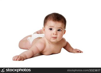 Beautiful cute happy Caucasian Hispanic baby infant laying on belly, wearing diaper, isolated.