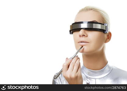 beautiful cyber woman applying lipstick using lip concealer brush