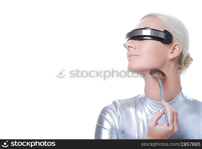 Beautiful cyber woman applying make-up