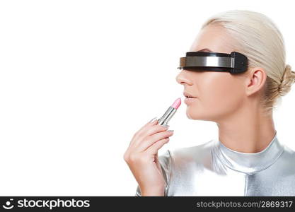 Beautiful cyber woman applying make-up