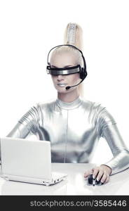 Beautiful cyber woman working on her laprop