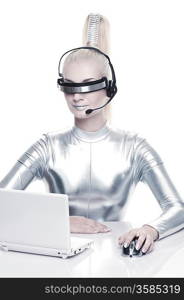 Beautiful cyber woman working on her laptop