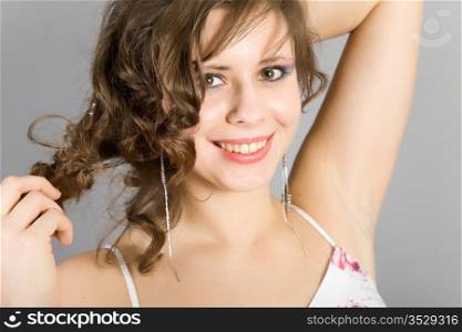 beautiful dancing girl on a gray background