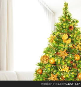 Beautiful decorated Christmas tree at home, luxury golden decoration, happy New Year celebrations, winter holidays concept
