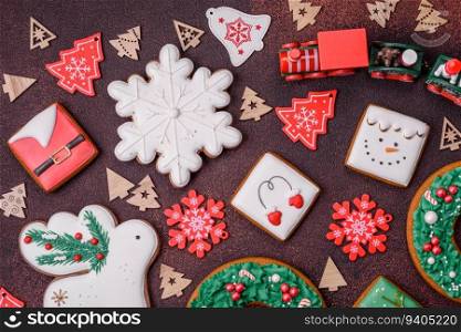 Beautiful delicious Christmas gingerbread on a concrete texture background. Christmas ornament