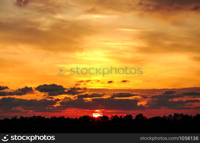 Beautiful dramatic sunset with twilight color sky and clouds