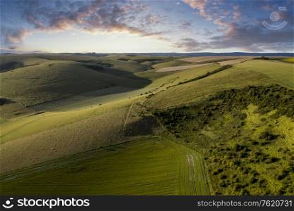Beautiful drone landscape image of English countryside during late afternoon sunset Summer light