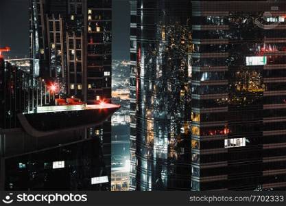 Beautiful Dubai Night Scene. Lights of Skyscrapers at Nighttime. Luxury Property. Middle East Travel Destination. United Arab Emirates 