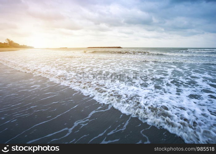 Beautiful early morning sunrise over the sea the horizon at Hat Chao Samran beach in Phetchaburi Thailand.