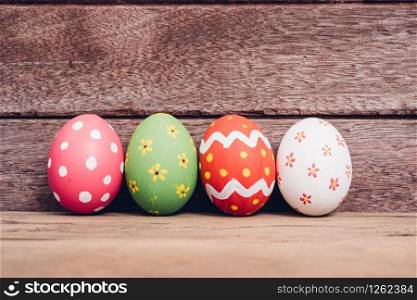 Beautiful Easter egg on wooden background, Easter day concept