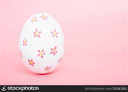 Beautiful Easter White egg color on pink background, Easter day concept