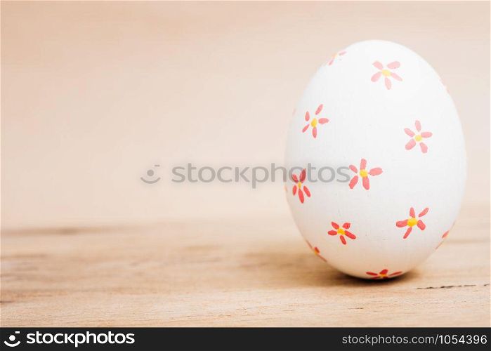 Beautiful Easter White egg on wooden background, Easter day concept