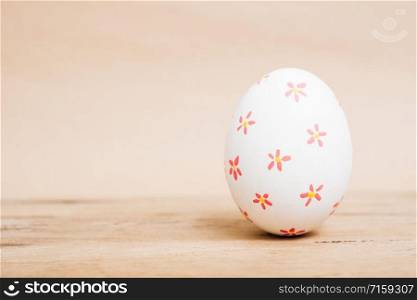 Beautiful Easter White egg on wooden background, Easter day concept