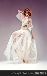 Beautiful elegant woman in white vintage dress - retro victorian style, renaissance