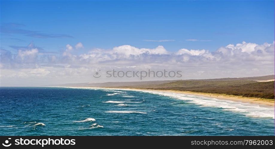 Beautiful endless Australian beach on Stradbroke Island, Queensland