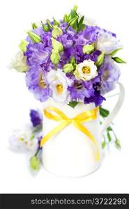 Beautiful eustoma flowers bouquet over white
