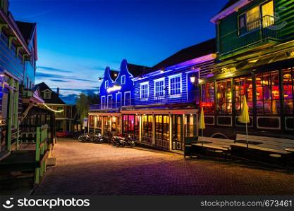 Beautiful Evening in Volendam, Dutch colorful houses and pubs Holland, Netherlands