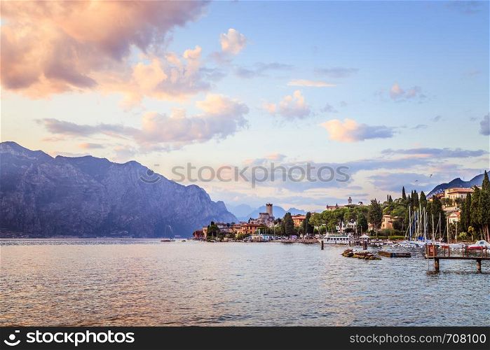 Beautiful evening scenery with cute little village, lago di garda, Italy