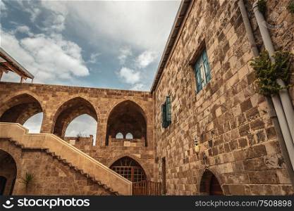 Beautiful exterior of an old ancient church, place of worship, house of god, majestic building over sky background, Lebanon