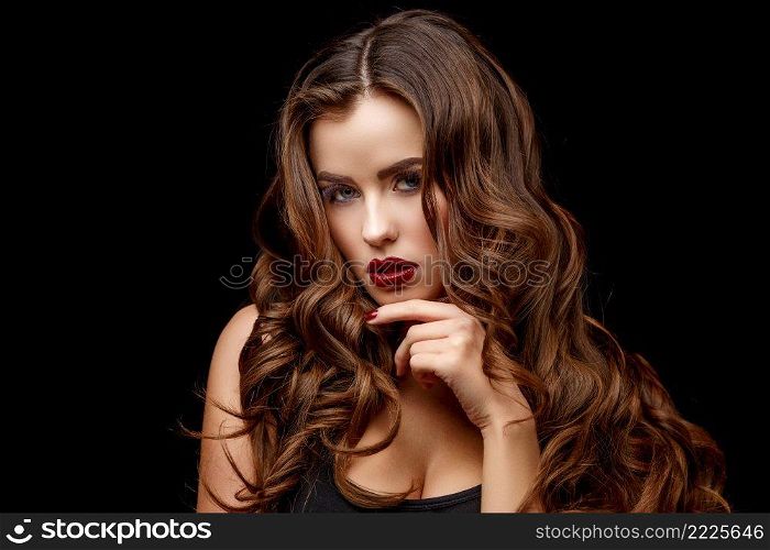 Beautiful Face of Young Woman with Clean Fresh Skin and healthy curly hair close up on black background. Beautiful Woman with Clean Fresh Skin and healthy curly hair