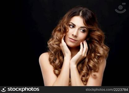 Beautiful Face of Young Woman with Clean Fresh Skin Beauty Portrait. Perfect Fresh Skin. Pure Beauty Model. Youth and Skin Care Concept. Beautiful Woman with Clean Fresh Skin on dark background