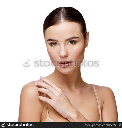 Beautiful Face of Young Woman with Clean Fresh Skin close up isolated on white. Beauty Portrait. Beautiful Spa Woman. Perfect Fresh Skin. Pure Beauty Model. Youth and Skin Care Concept. Beautiful Young Woman with Clean Fresh Skin