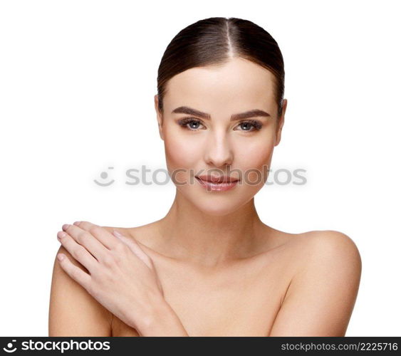 Beautiful Face of Young Woman with Clean Fresh Skin close up isolated on white. Beauty Portrait. Beautiful Spa Woman. Perfect Fresh Skin. Pure Beauty Model. Youth and Skin Care Concept. Beautiful Young Woman with Clean Fresh Skin