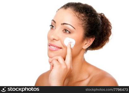 Beautiful face of young woman with hand applying exfoliating anti wrinkle cream beauty treatment for skincare, isolated.